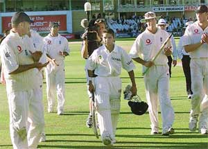 India's 17-year-old wicket-keeper Parthiv Patel , with bat and helmet
