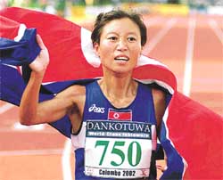 Ham Pong Sil of North Korea celebrates after winning the gold medal