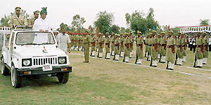 Chief Minister Om Prakash Chautala inspects the parade at a state-level Independence Day function in Rewari on Thursday.