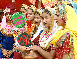 A view of the folk dance being presented by girls