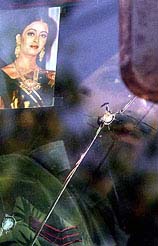 A soldier peers from his Army truck