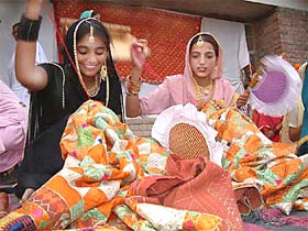Girls participate in a festival