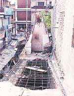 The damaged roof of the office of Jagdish Tangri, in Gur Mandi, Ludhiana