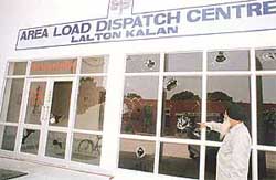 A file photograph of damaged windowpanes