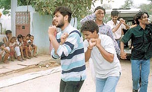 Artists from National School of Drama enacting a street play in Palam Vihar.