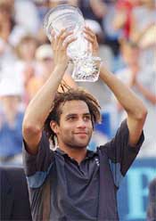 James Blake hoists the winner's trophy
