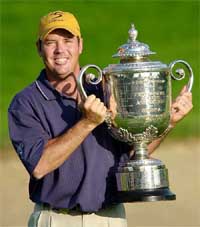 Rich Beem of the United States holds the Wanamaker Trophy