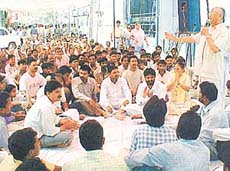 Mr Sat Pal Gosain, former Deputy Speaker of the Punjab Assembly, addresses a rally of the Municipal Karamchari Dal in front of the MC headquarters in Ludhiana on Tuesday. 