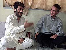 Shabir Shah, President of the separatist Jammu Kashmir Democratic Freedom Party, shares a light moment