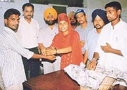 Inmates of Borstal Jail being tied rakhis by activists of the Nehru Sidhant Kandra in Ludhiana on Thursday.