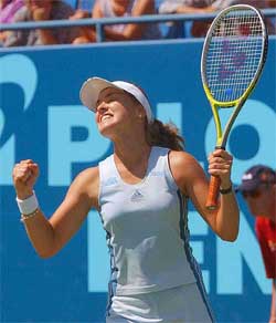 Switzerland's Martina Hingis celebrates after defeating Alexandra Stevenson, of San Diego