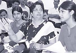 Madhu Sharma, wife of Ravi Kant Sharma, suspended Inspector-General of Police and the prime accused in the Shivani Bhatnagar murder case, flanked by her daughters, Komal and Pragati