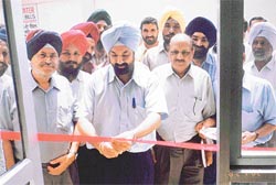 Mr G.S. Julka, GM Telecom, Ludhiana, inaugurates a cash counter in BRS Nagar