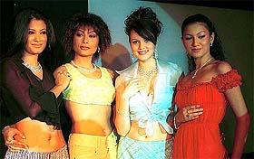 Models display platinum creations