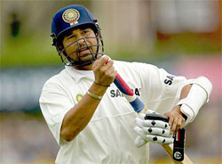 Sachin Tendulkar leaves the field after falling short of his double century