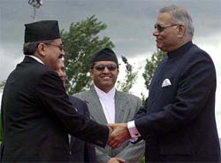 Indian External Affairs Minister Yashwant Sinha is seen off by Nepal's Junior Foreign Minister