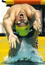 Mathew Welsh of Australia competes in the men's 100 m backstroke heats