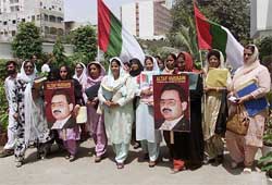 Women candidates belonging to the Muthedda Qaumi Movement party arrive to submit their nomination papers