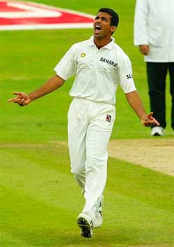 India's Zaheer Khan celebrates taking the wicket of England's Andrew Flintoff 