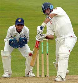 England's captain Nasser Hussain hits a four