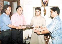 Mr C. K. Khanna, secretary of the Chand Khanna Cricket Club, and vice-president of the Board of Control for Cricket in India, felicitating Mr Jyotiraditya Scindia on his becoming chairman of the Madhya Pradesh Cricket Association.