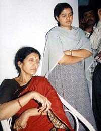Nagappa's wife and their daughter in a pensive mood