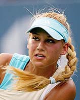 Russia�s Anna Kournikova serves against Angelique Widjaja