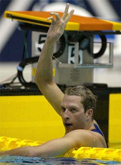 Thomas Malchow of the USA celebrates after winning the men's 200 metre butterfly final of the Pan Pacific Swimming Championships