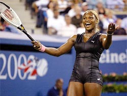 Serena Williams of the USA laughs during her match