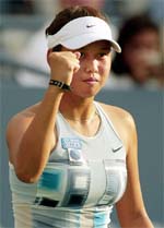 Angelique Widjaja of Indonesia celebrates her win over Anna Kournikova of Russia