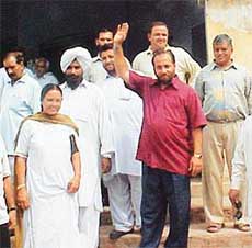 A former municipal councillor, Mr Harish Sasan, who is alleged to have assaulted Ambala City MLA Veena Chhibber surrenders in a court in Ambala on Wednesday.