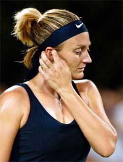 Mary Pierce of France reacts during her loss to Paola Suarez of Argentina