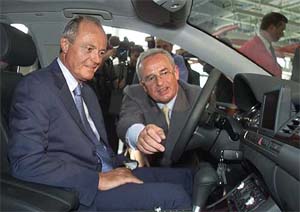 Hungarian Prime Minister Peter Medgyessy sits in a new A-8 Audi model