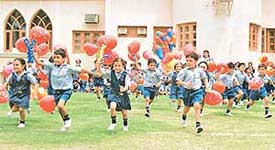 Tiny tots participate in a balloon race to mark National Sports Day at The Gurukul