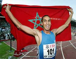 Brahim Boulami of Morocco appears on this file photo celebrating his new world record in the 3,000 meters steeplechase