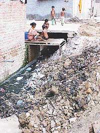 The filthy condition of one of the streets in Upkar Nagar