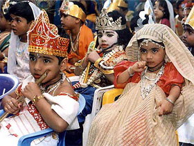 Children dressed as 'Sri Krishna-Rukmani' in a fancy dress competition