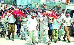 The bodies of sisters Minsha and Richa, who died in the temple