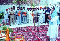 The DSGMC members at a prayer on the occasion of Guru Harkrishan's birthday.