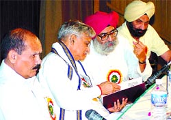 Bhure Lal, Dr Murli Manohar Joshi, V. S. Jauhar and Tarlochan Singh at a seminar