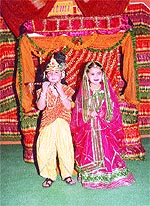 Tots dressed as Radha and Krishna. 