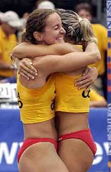 Italian teammates Daniela Gattelli and Lucilla Perotta jubilate after winning the beach volleyball European Championships