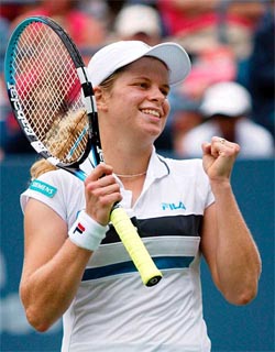 Kim Clijsters of Belgium celebrates her win over Vera Zvonareva