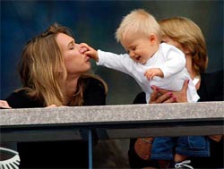 Steffi Graf and son Jaden Gil Agassi play in the stands