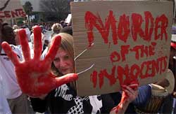 A protestor demonstrates against animal rights abuses