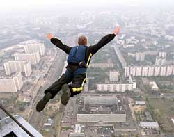 A base jumper leaps from a 365 metre-high platform 