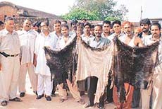 Members of the Chandigarh Meat Association hold a protest in Chandigarh on Monday