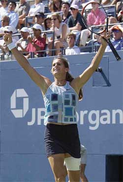Amelie Mauresmo of France celebrates her win over Jennifer Capriati