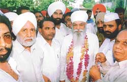 The PPCC president, Mr H.S. Hanspal, being honoured at a function