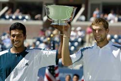 Mahesh Bhupathi  of India and Max Mirnyi of Belarus hold their trophy after winning the US Open men�s doubles title